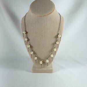 BAROQUE PEARL 22 INCH SILVER TONE  NECKLACE WITH DANGLING CHAINS.